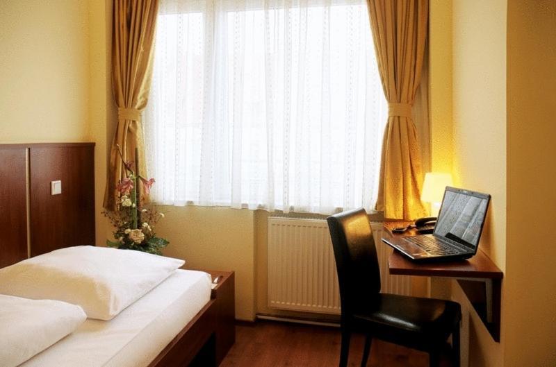 Atlas City Hotel ميونيخ الغرفة الصورة